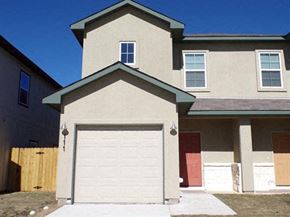 Marble Falls apartment for rent - a white house with a white garage door
