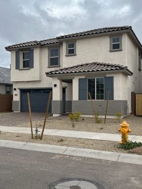 Surprise house for rent - a house with a yellow fire hydrant in front of it