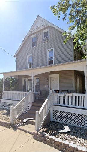 Warren apartment for rent - a house with a porch and a white fence