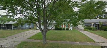 Warren house for rent - a house with a yard and a tree in front of it