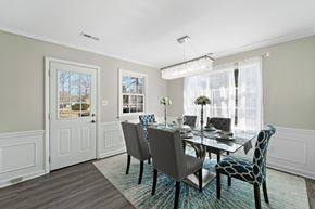 Jacksonville house for rent - A dining room with a table set for four.