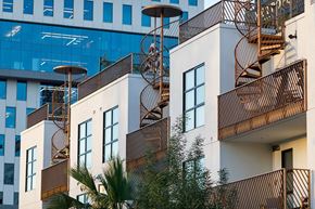 Los Angeles apartment for rent - a row of apartments with balconies and fire escapes