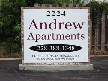 Biloxi apartment for rent - a sign on the side of the road