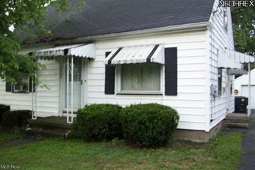Warren house for rent - a white house with black shutters and a porch