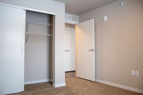 Jamestown apartment for rent - a bedroom with a closet and an open closet door