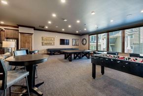 Ellensburg apartment for rent - a game room with a foosball table and ping pong table