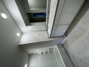Youngsville house for rent - A bathroom with a shower and a window.
