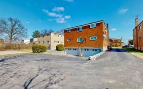 Cincinnati apartment for rent - a large brick building on the side of a street
