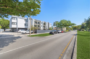 North Miami apartment for rent - an empty street with buildings on the side of it