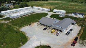 Clinton apartment for rent - an aerial view of a farm with cars parked in a parking lot