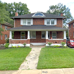 Roanoke apartment for rent - A red brick house with a white front porch.