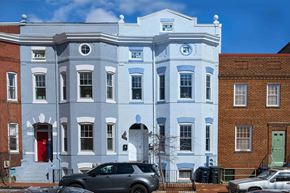 Washington apartment for rent - a blue and white building on a city street