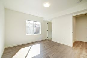Washington apartment for rent - a living room with white walls and a window