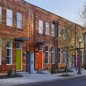 Washington apartment for rent - a row of houses with colorful doors on a street