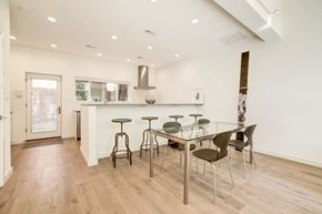 Washington apartment for rent - A kitchen with a table and chairs.
