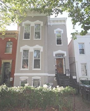 Washington apartment for rent - a building with a staircase and a front door