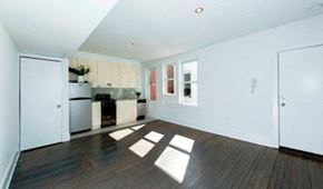 Washington apartment for rent - a large living room with a kitchen in it