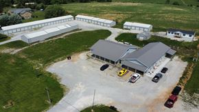 Clinton apartment for rent - an aerial view of a farm with cars parked in a parking lot