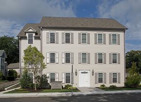 Darien apartment for rent - A large house with a white door and windows.