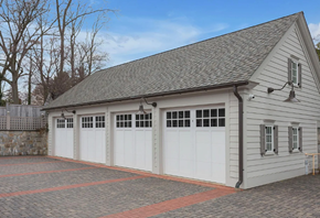 Darien apartment for rent - A two-car garage with a grey roof and white doors.