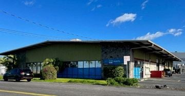 Kailua-Kona apartment for rent - a building with a car parked in front of it