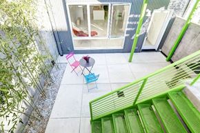 Washington apartment for rent - A balcony with a table and chairs.