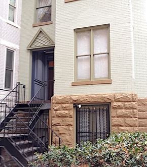 Washington apartment for rent - a white house with a window and stairs