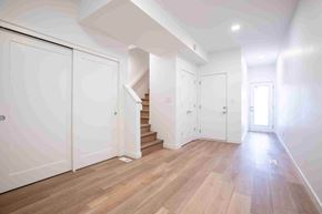 Winnipeg apartment for rent - A room with wooden floors and white walls.