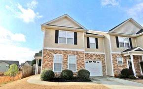 Greer house for rent - A two-story house with a garage and a driveway.