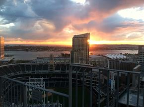 San Diego house for rent - the sun sets over the city and the baseball stadium and the river