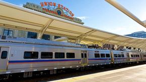 Denver apartment for rent - A silver train is parked at Union Station.