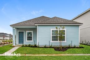 Yulee house for rent - a blue house with a small tree in the front yard