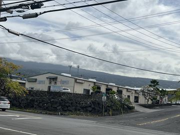 Kailua-Kona apartment for rent - a city street with houses and a mountain in the background
