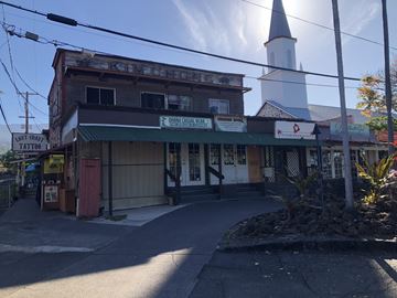 Kailua Kona apartment for rent - an old building with a church in the background