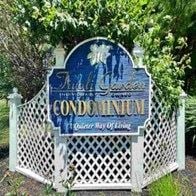 Tivoli apartment for rent - a blue sign in front of a white fence