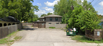 Pasadena apartment for rent - a house with a dirt road and a green dumpster