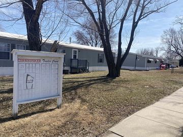 Kearney apartment for rent - a sign in front of a mobile home