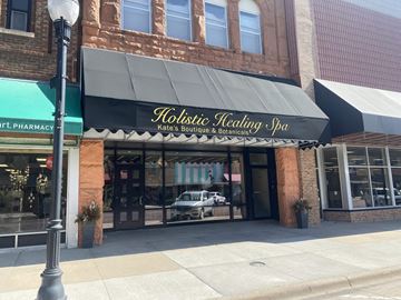 Kearney apartment for rent - the front of a restaurant with a black awning on a building