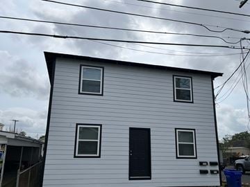 Thibodaux apartment for rent - a white house with a black door and windows