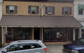 Chester apartment for rent - A car is parked in front of a store that specializes in gospel music.