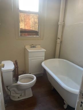 Chester apartment for rent - A white toilet and sink in a small bathroom.
