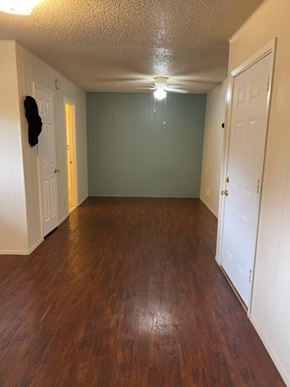 Austin apartment for rent - A hallway with wood floors and white doors.