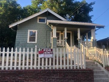 Portland apartment for rent - a house with a for rent sign in front of it