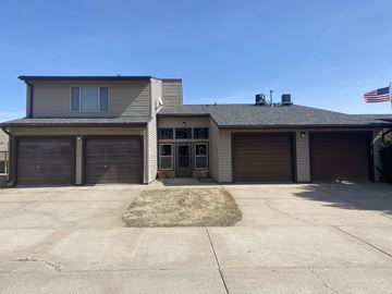 Kearney apartment for rent - a home with three garages and an flag