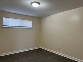 Roanoke apartment for rent - an empty room with a window and wooden floors