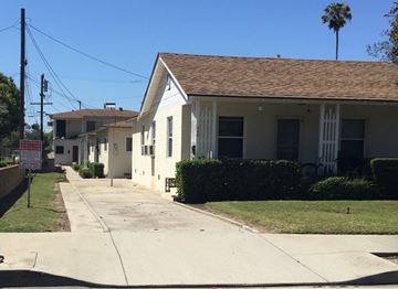Glendora apartment for rent - a white house with a sidewalk in front of it