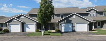 Cold Spring apartment for rent - a house with two garage doors on a street