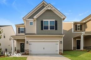 Simpsonville house for rent - A two-story house with a garage is for sale.
