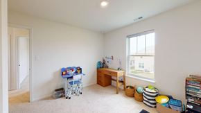 Crown Point house for rent - A room with a desk, chair, and toys.
