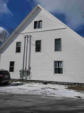New Glasgow apartment for rent - the outside of a white building with snow on the ground